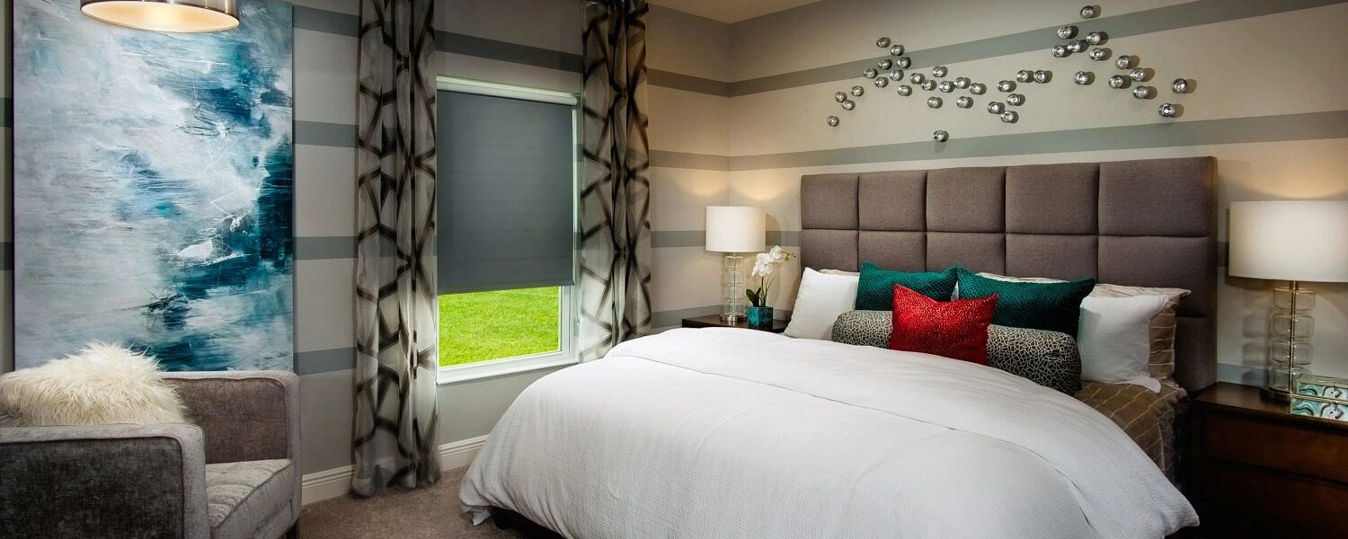 Shades installed in a warm bedroom interior