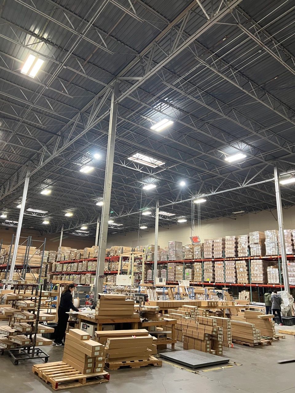 Inside the BWS Blinds warehouse in Carrollton, Texas, with custom blinds and shades being assembled and packed